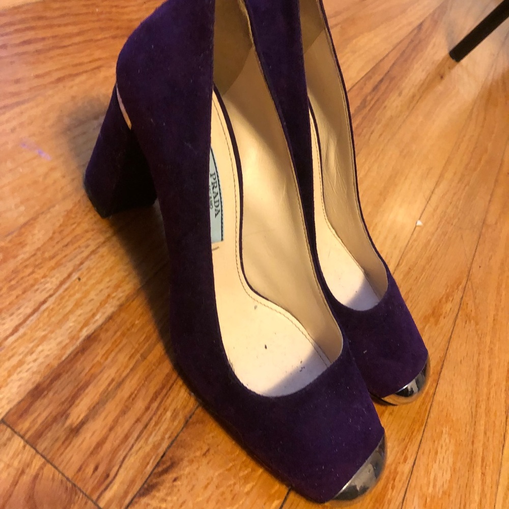 Used dark purple Prada pumps with metal cap toe
